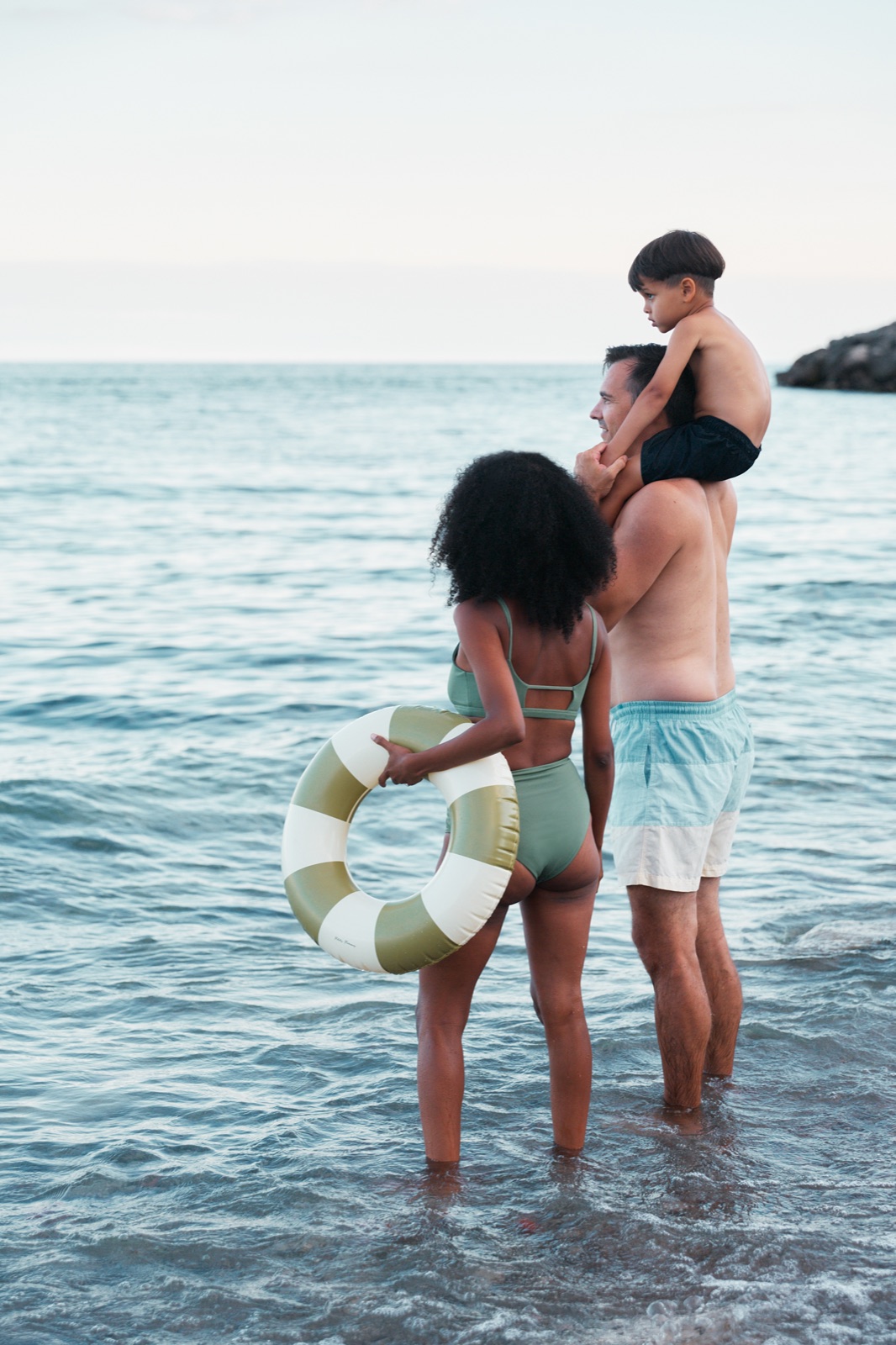 Family enjoying the beach at the Lakeview Village shoreline